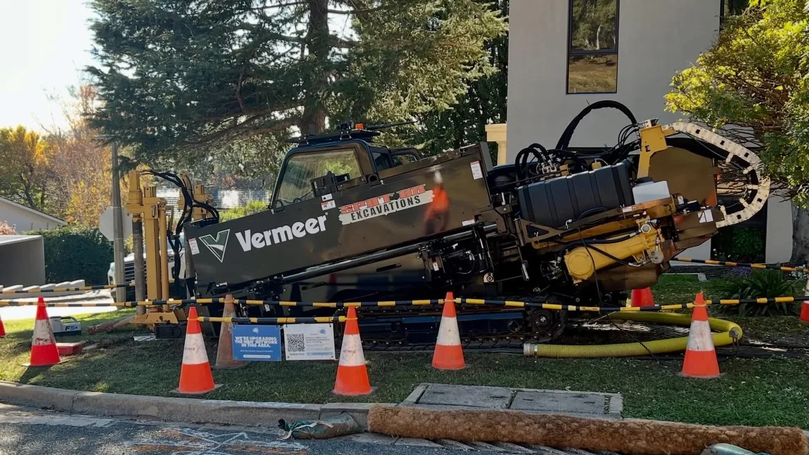 Spot On Vermeer directional drill operating in a marked work zone in Canberra.